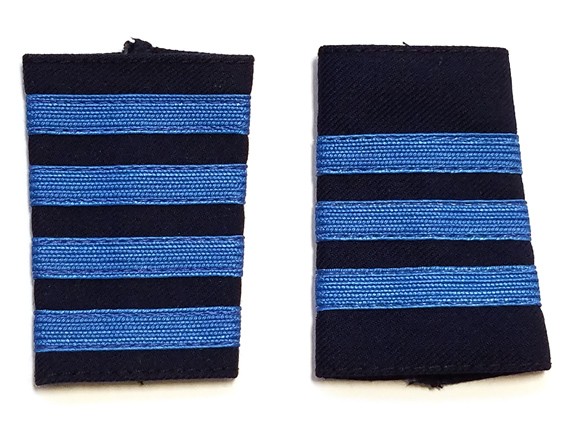 blue shirt with epaulettes